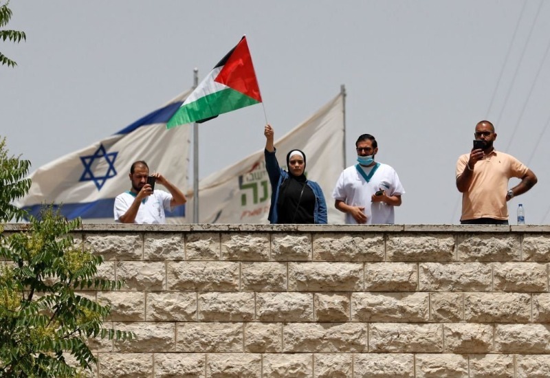 "أرادوا إسقاط العلم الفلسطيني فأسقطنا أعلامهم"..
