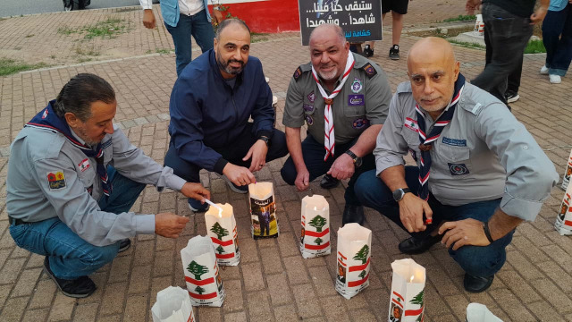 وقفة رمزية واضاءة 82 شمعة تحية من "كشافة لبنان المستقبل" للرئيس الشهيد رفيق الحريري بذكرى ميلاده