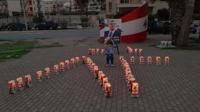 وقفة رمزية واضاءة 82 شمعة تحية من "كشافة لبنان المستقبل" للرئيس الشهيد رفيق الحريري بذكرى ميلاده
