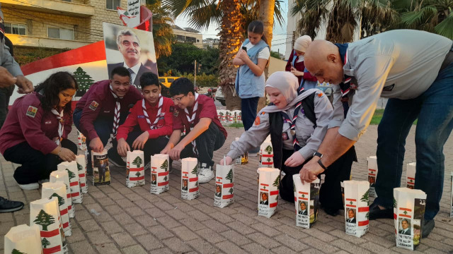 وقفة رمزية واضاءة 82 شمعة تحية من "كشافة لبنان المستقبل" للرئيس الشهيد رفيق الحريري بذكرى ميلاده